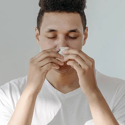 person sneezing
