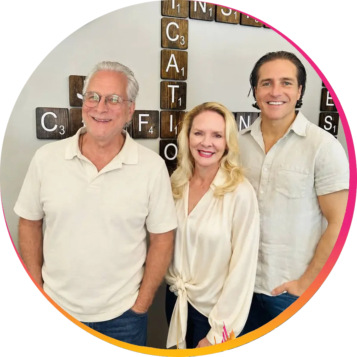Dr. John Johr, Dr. Anna Saylor, and Dr. Zach Conner of Van Every Family Chiropractic Center smiling together in the Royal Oak office